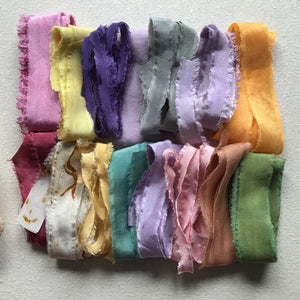 A box of narrow silk ribbons ~ Pastels or Brights